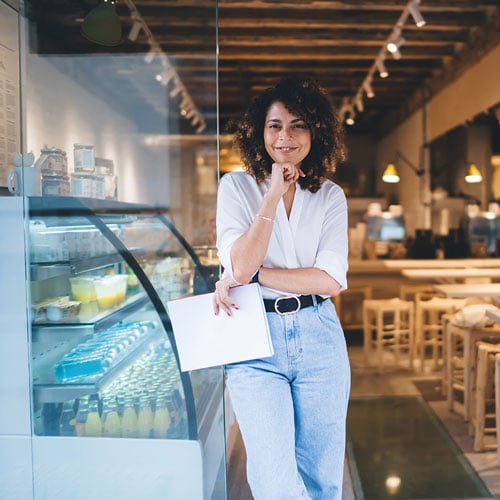 Franchise owner standing in restaurant