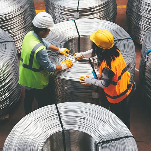 Workers working in metals manufacturing