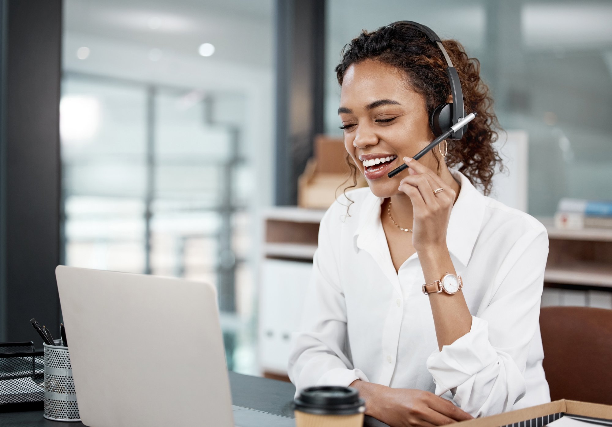 Customer service woman taking care of clients on the phone